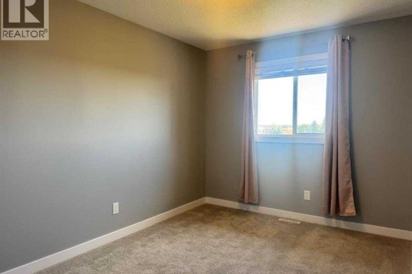 Bedroom - 8453 101 Avenue, Grande Prairie, AB T8X0R1 Photo 5