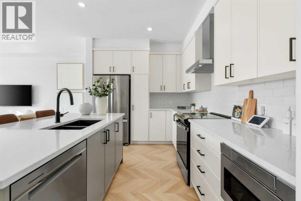 Kitchen - 8493 21 Avenue Se, Calgary, AB T2A0M8 Photo 3