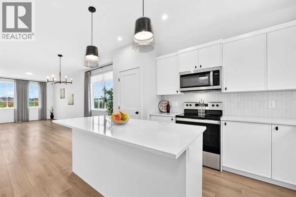 Kitchen - 85 Heirloom Way Se, Calgary, AB T3S0H3 Photo 2