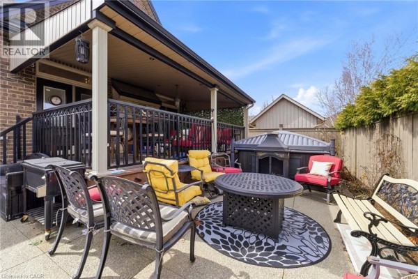 Basement with exposed beams, ductwork, storage boxes, and crutches - 85 Hillcroft Drive Stoney Creek