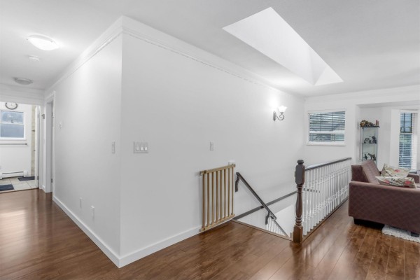 Bathroom with modern fixtures, sink, and glass shower enclosure. - 8502 148 Street, Surrey