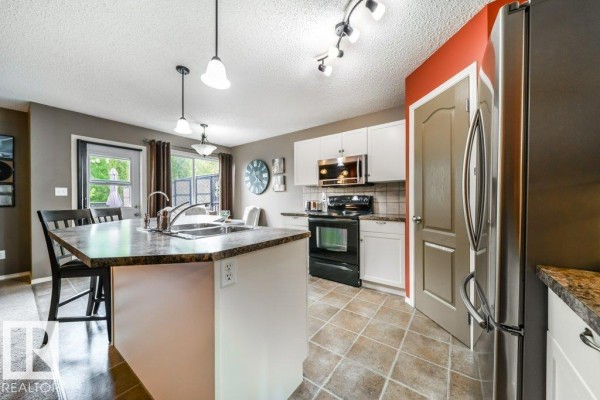 Dining room - 8507 2 Av Sw, Edmonton, AB T6X1H5 Photo 2