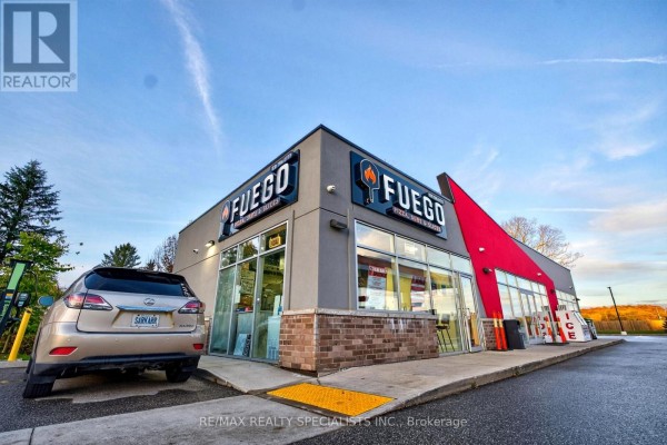 Gas station view featuring Fuego restaurant and fuel pumps - 87 Garafraxa Street, Chatsworth