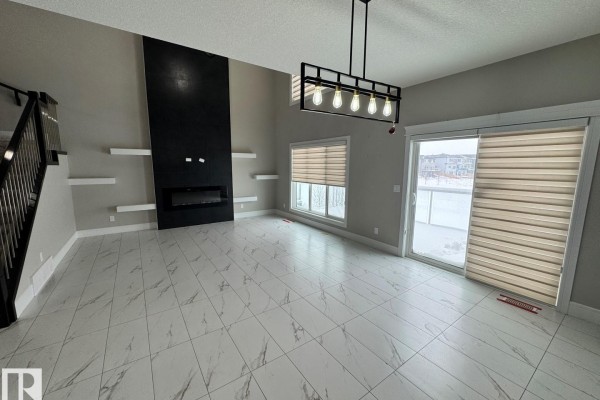 Family room - 8729 Mayday Ln Sw, Edmonton, AB T6X2L3 Photo 4