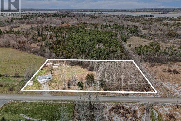 Aerial view of the property outlined with a white polygon, showing the house and land. - 88 Bay Road, Rideau Lakes