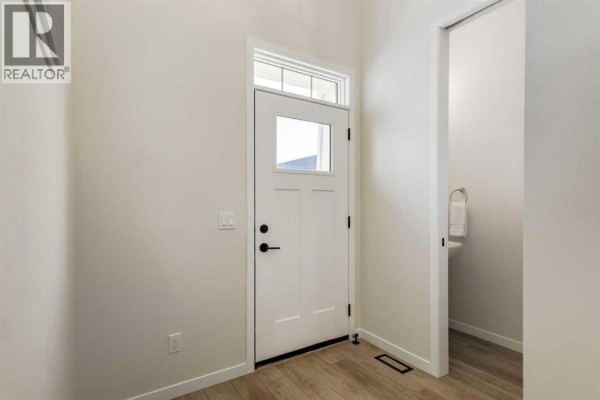 Kitchen - 88 Bluerock Terrace Sw, Calgary, AB T2Y0V7 Photo 3