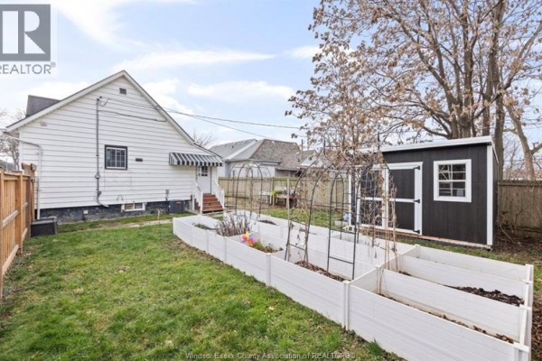 Raised garden beds and storage shed in backyard - 894 University Avenue Windsor