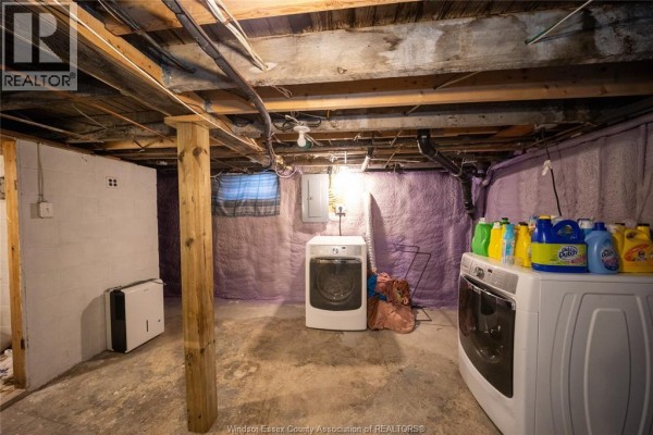 Washer and dryer in basement laundry room with dehumidifier - 894 University Avenue Windsor