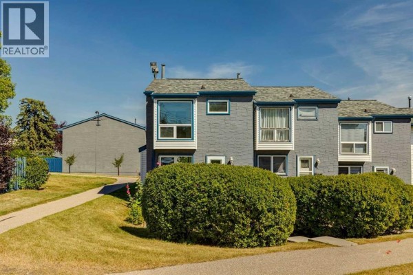 Living room - 9, 6440 4 Street Nw, Calgary, AB T2K1B8 Photo 3