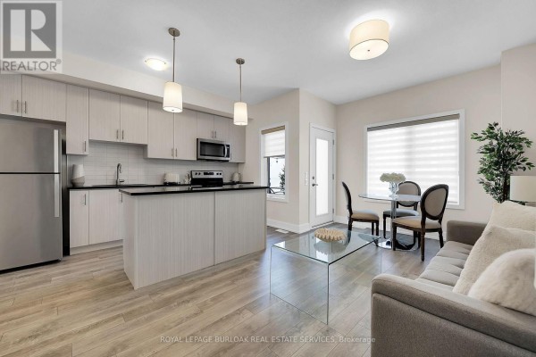 Great room - 9 - 115 Shoreview Place, Hamilton, ON L8E0K4 Photo 4