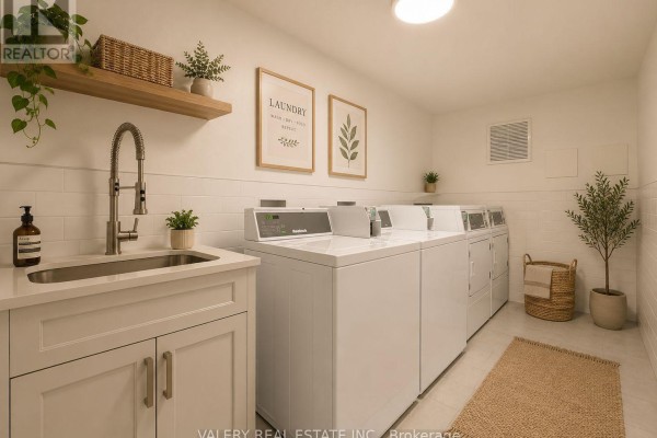 Communal laundry room with white tile backsplash, a sink, faucet, multiple white washing machines, and decorative plants. - 9 - 20 Craig Street, London South