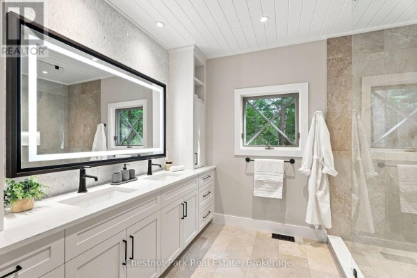 Double vanity, illuminated mirror, and glass shower - 90 Swallowdale Road Huntsville