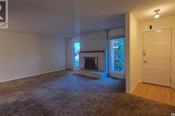 Living room - 9012 Mitchell Avenue, North Battleford, SK S9A3J7 Photo 3