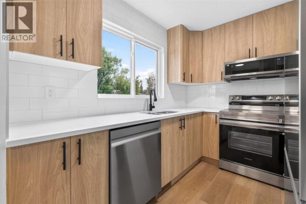 Living room - 905, 5340 17 Avenue Sw, Calgary, AB T3E6M3 Photo 4