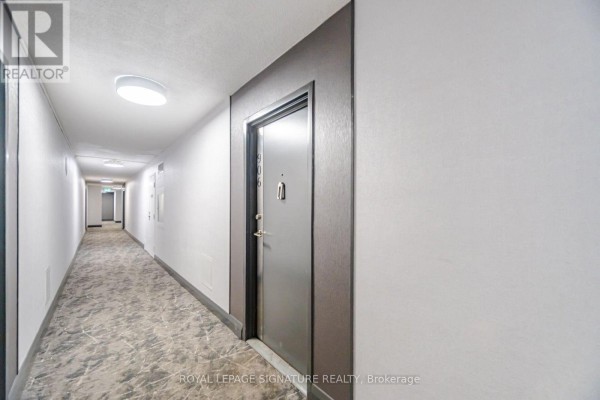 Recreation room with an air hockey table, ping pong table, shuffleboard, and bookshelves. - 906 - 1580 Mississauga Valley Boulevard, Mississauga