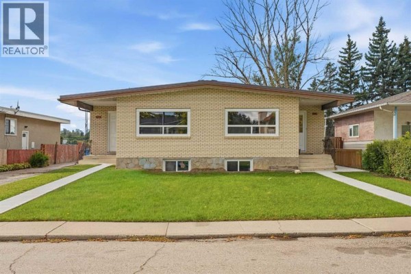 Bedroom - 907 / 909 16 Street Ne, Calgary, AB T2E4S7 Photo 2