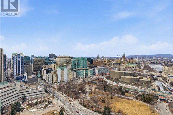 Panoramic aerial view of Ottawa cityscape with Parliament buildings and parkland. - 909 - 161 Laurier Avenue W, Ottawa