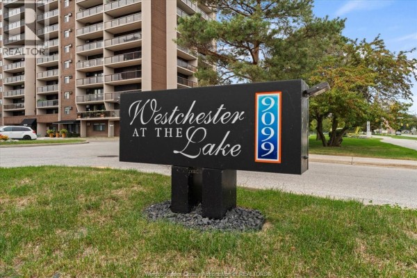 Sign for Westchester at the Lake building with address 9099. - 9099 Riverside Drive East Unit# 907, Windsor