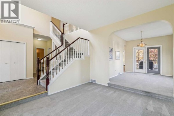 Living room - 912 Woodbine Boulevard Sw, Calgary, AB T2W5Y7 Photo 2
