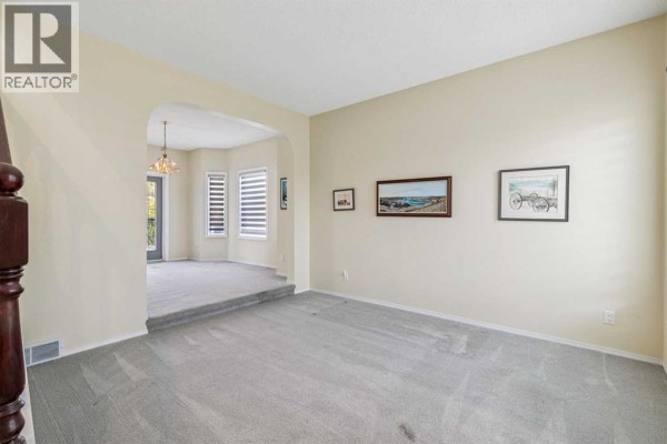 Family room - 912 Woodbine Boulevard Sw, Calgary, AB T2W5Y7 Photo 4