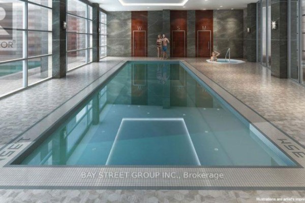 Indoor swimming pool and hot tub with large windows and tile flooring. - 919 - 4955 Yonge Street, Toronto