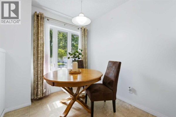 Kitchen - 92, 388 Sandarac Drive Nw, Calgary, AB T3K4E3 Photo 4
