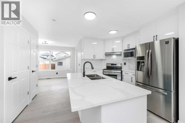 Laundry room - 92 Taralake Park Ne, Calgary, AB T3J0B7 Photo 5