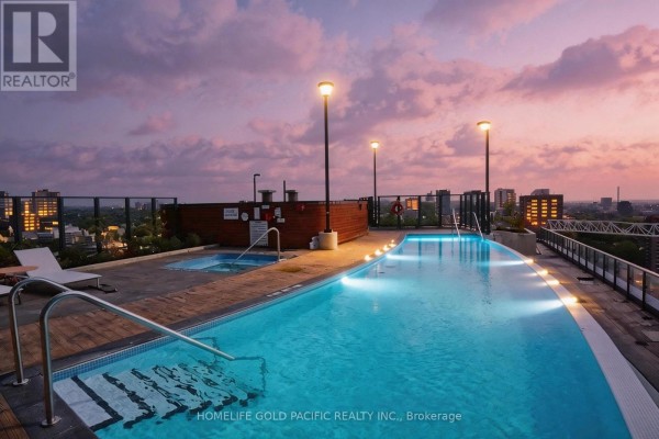 Bird's-eye view of landscaped terraces with seating areas and a pool - 925 - 251 Jarvis Street, Toronto