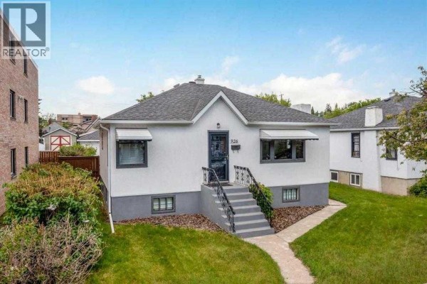 Living room - 926 2 Avenue Nw, Calgary, AB T2N0E6 Photo 2