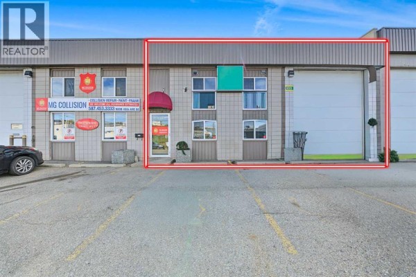 Commercial building exterior with red outline highlighting specific units. - 933a 48 Avenue Se, Calgary
