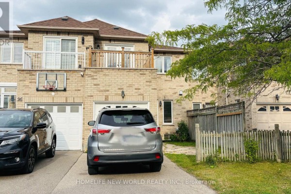 Street view of brick townhouses with garages, driveways, and wooden fences. - 94 Forestwood Street, Richmond Hill