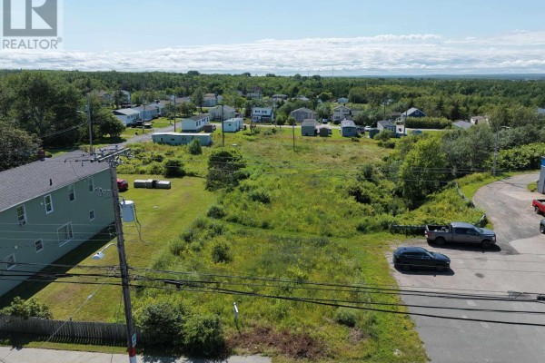 Close-up aerial view of parking area on Mitchell Ave, showing vehicles and property lines. - 94 Mitchell Ave Dominion Land, Dominion