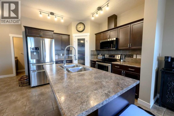 Laundry room - 9433 88 Street, Grande Prairie, AB T8X0H2 Photo 5