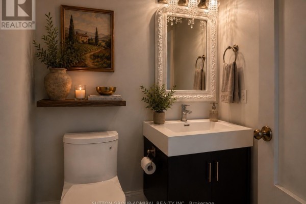 Primary bathroom with dual vanities, a glass-enclosed shower, and a soaking tub. - 949 Line 9 Road, Niagara On The Lake