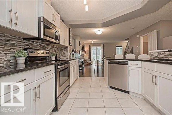 Bedroom 2 - #95 4050 Savaryn Dr Sw, Edmonton, AB T6X1R8 Photo 5
