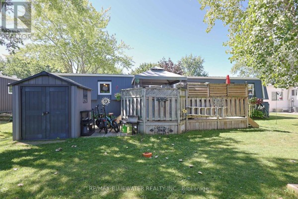 Backyard with shed, deck, and gazebo - 95 Shannon Boulevard South Huron