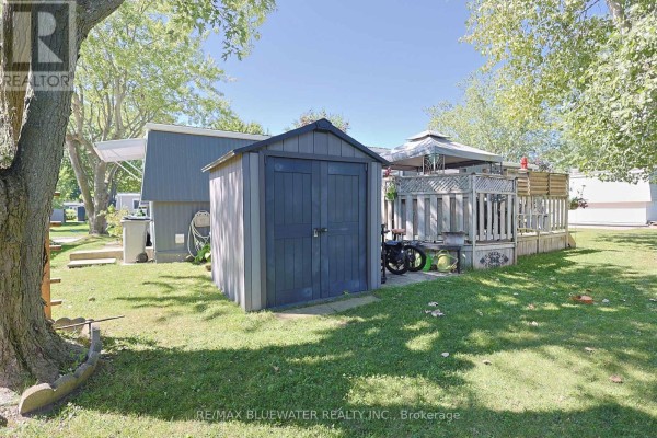 Storage shed, wooden deck, and gazebo in backyard - 95 Shannon Boulevard South Huron