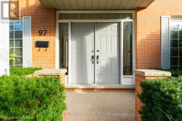 Close-up of the double front doors with house number 97, sidelights, and brick exterior. - 97 Timber Drive, London South