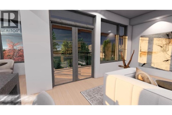 Interior living room with white sofa, large windows, and glass doors leading to a balcony. - 9700 Santina Road Unit# 19, Lake Country