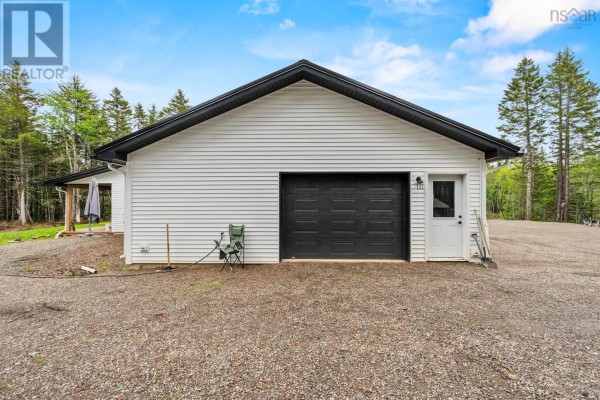 Spacious bathroom with a freestanding tub, walk-in shower with subway tile, and white walls. - 971 Barr Settlement Road, Barr Settlement
