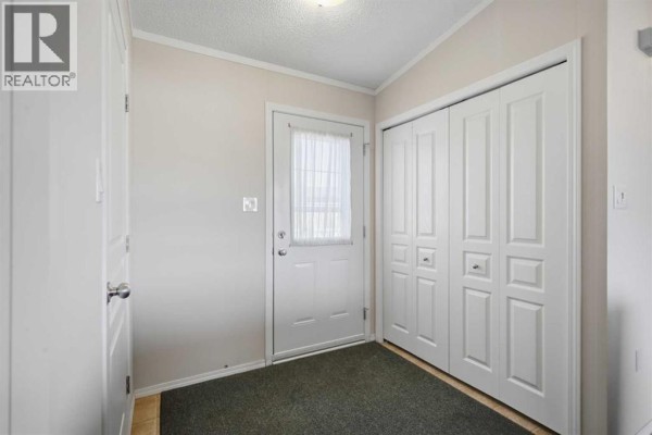 Bedroom - 98, 15 Mackenzie Ranch Way, Lacombe, AB T4L0B4 Photo 5