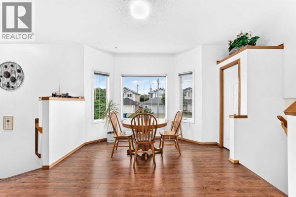 Living room - 98 Country Hills Heights Nw, Calgary, AB T3K4Y6 Photo 4