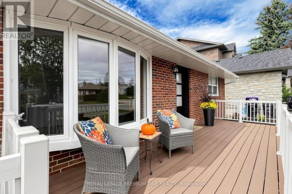 Close-up of front porch with wicker chairs and outdoor seating area. - 98 Thornton Avenue, Bradford West Gwillimbury