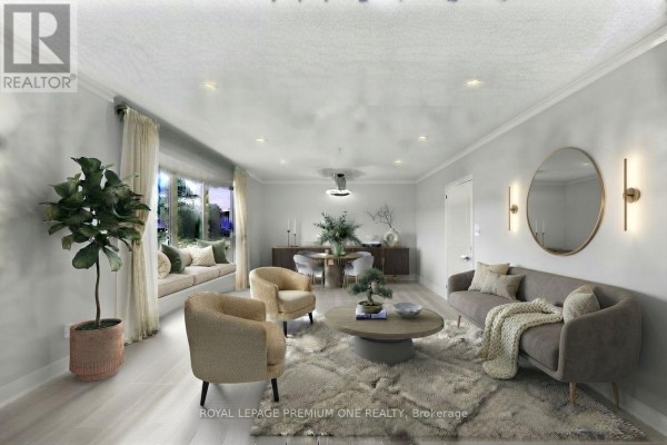 Living room with sofa, chairs, coffee table, and dining area. - 98 Thornton Avenue, Bradford West Gwillimbury