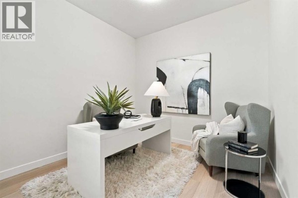 Living room - 99 Heritage Manor, Cochrane, AB T4C3K8 Photo 4