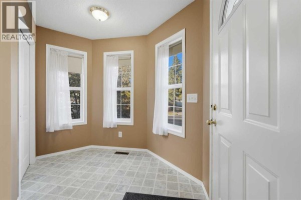 Bedroom - A, 407 Sunset Boulevard Nw, Diamond Valley, AB T0L2A0 Photo 3
