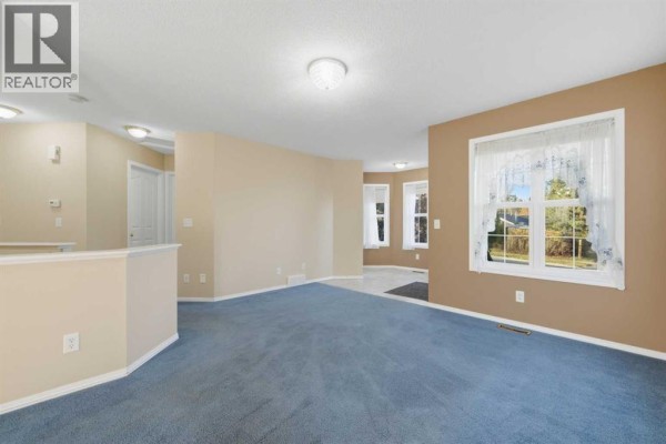 Dining room - A, 407 Sunset Boulevard Nw, Diamond Valley, AB T0L2A0 Photo 4