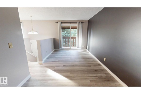 Primary Bedroom - #a 5940 45 Av, Lacombe, AB T4L1V7 Photo 4