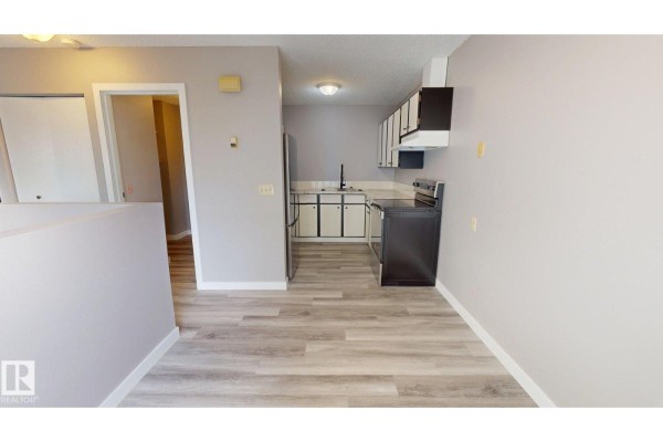 Bedroom 2 - #a 5940 45 Av, Lacombe, AB T4L1V7 Photo 5