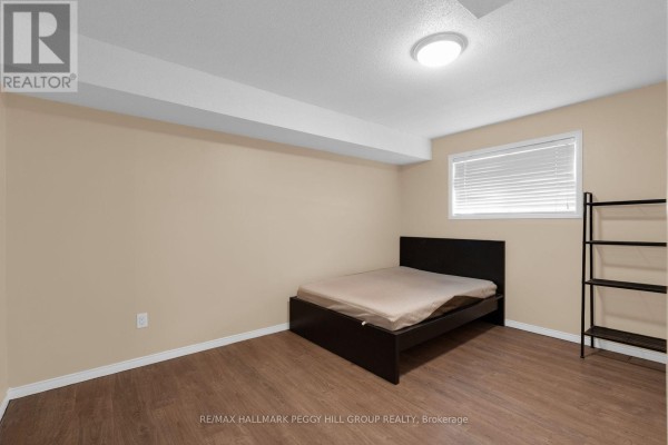 Living room - B02 - 120 Bell Farm Road, Barrie, ON L4M6J2 Photo 4